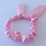 XUXINHA COM LAçO ROSA BEBE | Soulta - Imagem 2